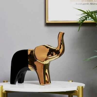 Статуэтка черный слон с золотым. Фигурка слоника для интерьера 1111 фото