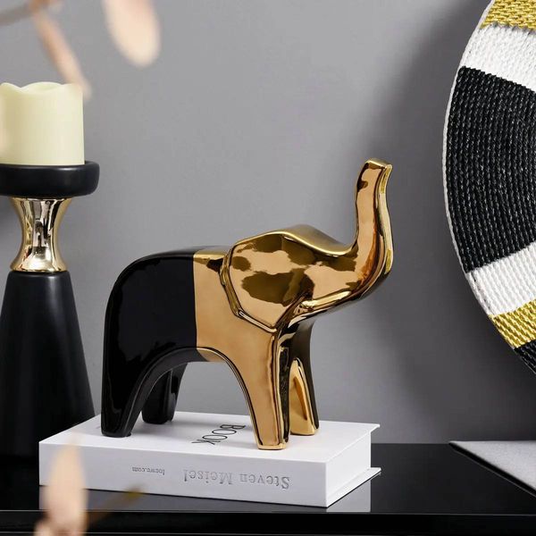 Статуетка слон чорний з золотим. Фігурка слоника для інтерьеру 1111 фото